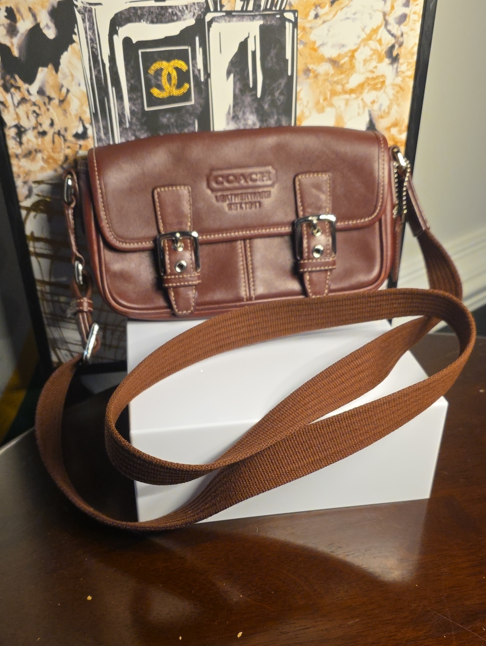 Coach Bleecker double-buckle crossbody bag featuring silver-tone hardware